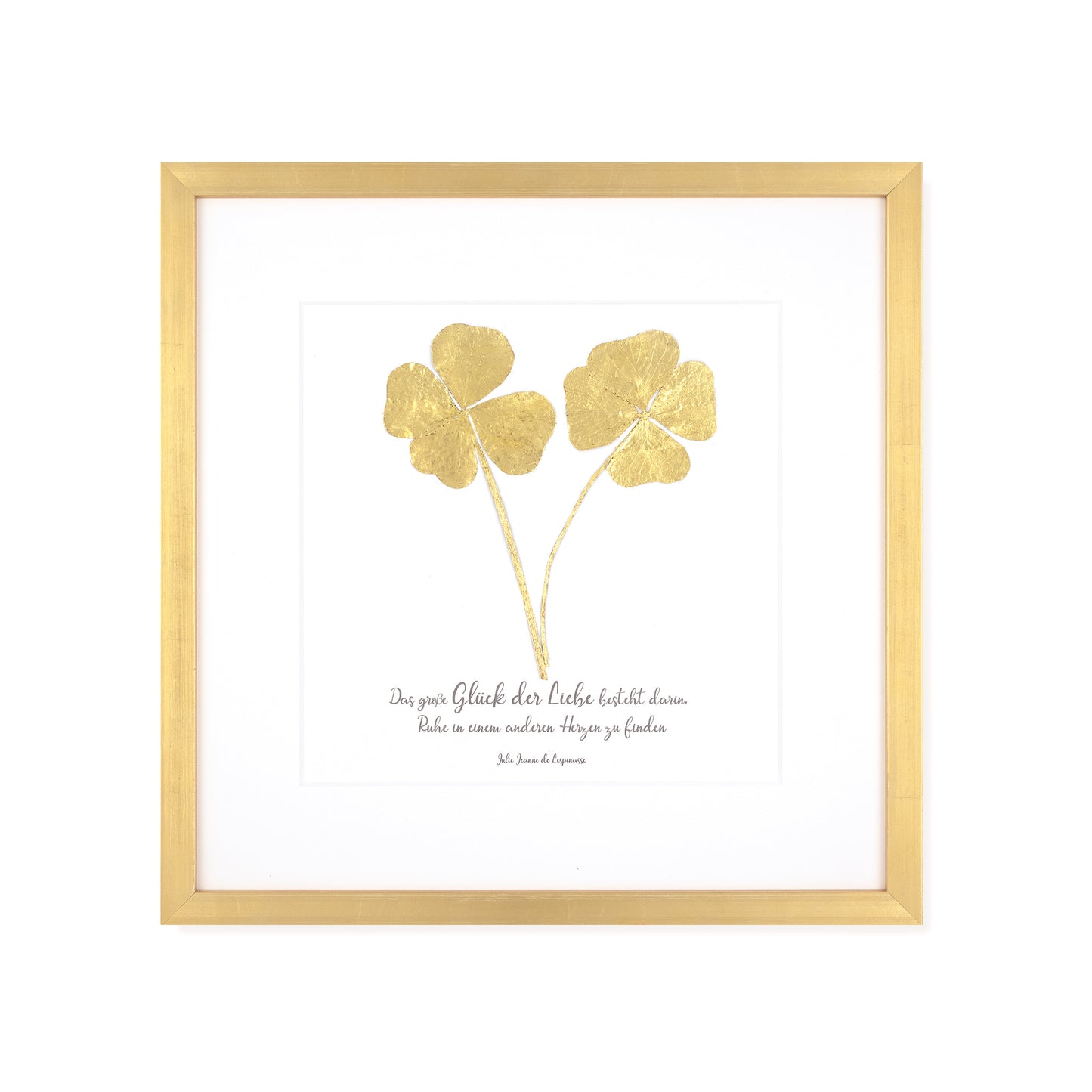 Goldenes Glück - Vergoldete vierblättrige Kleeblätter mit Spruch. Das große Glück der Liebe besteht darin, Ruhe in einem anderen Herzen zu finden. Poetisches Spruchbild mit Massivholzrahmen.