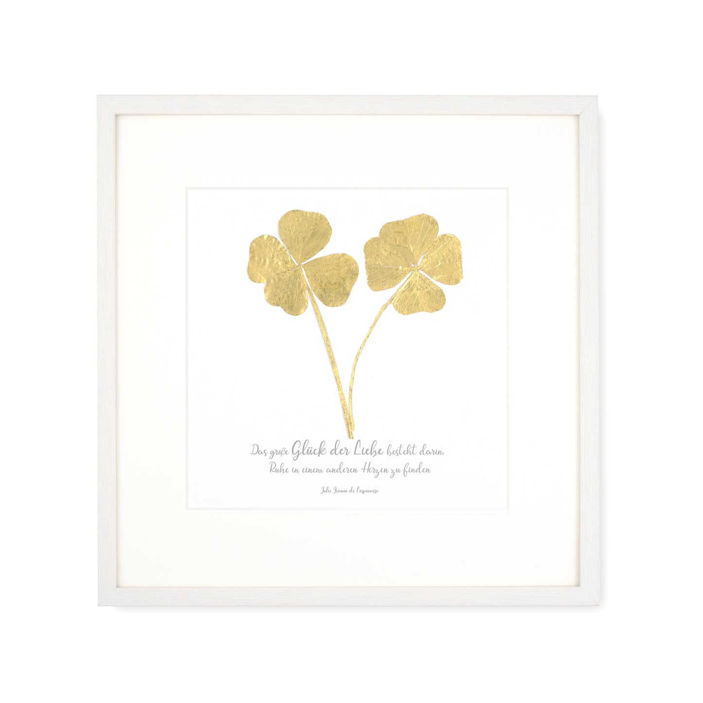 Goldenes Glück - Vergoldete vierblättrige Kleeblätter mit Spruch. Das große Glück der Liebe besteht darin, Ruhe in einem anderen Herzen zu finden. Poetisches Spruchbild mit Massivholzrahmen.